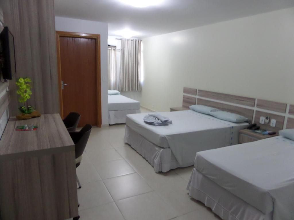 Cama ou camas em um quarto em Hotel CTC