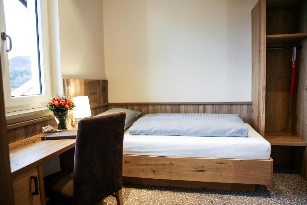 Postel nebo postele na pokoji v ubytování Hotel Friedenseiche