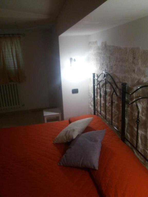 Postel nebo postele na pokoji v ubytování Il rifugio del conte