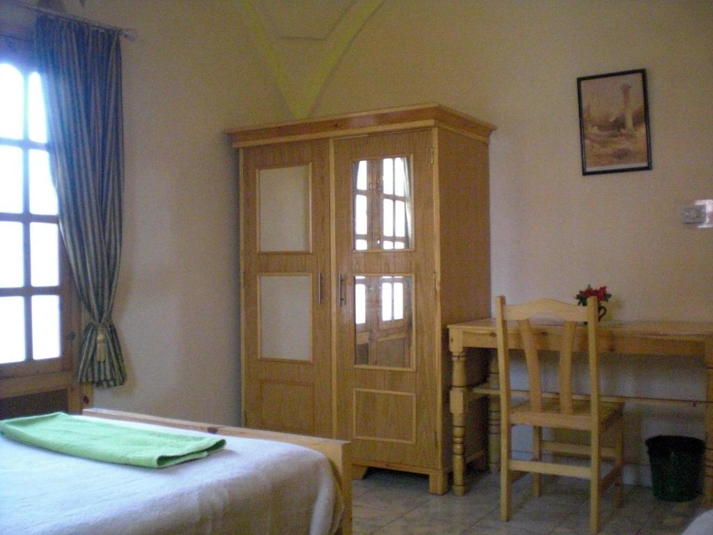 Postel nebo postele na pokoji v ubytování El Fayrouz Hotel