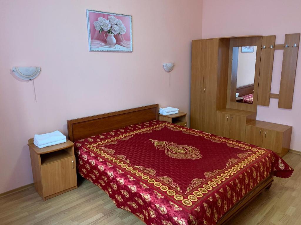 Postel nebo postele na pokoji v ubytování Inn on Zhytomyrska