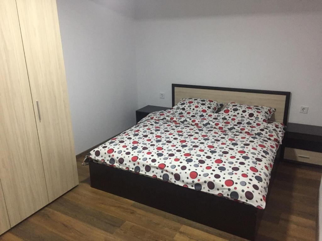 A bed or beds in a room at Dunav Apart