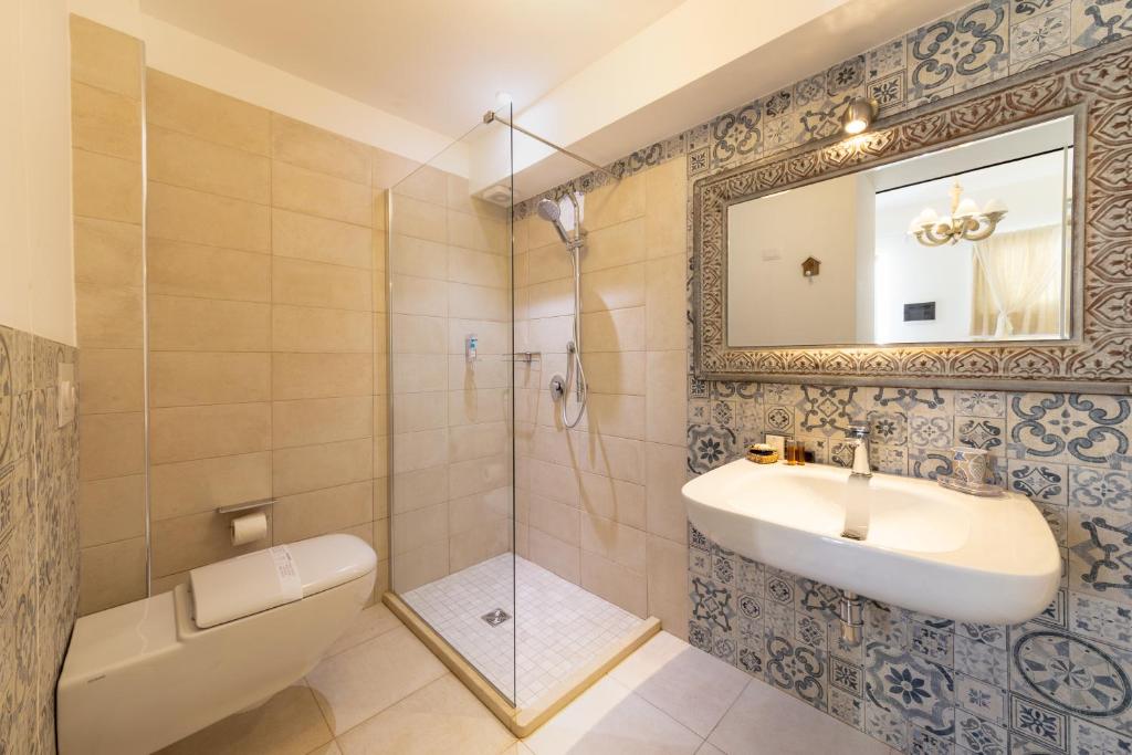 Koupelna v ubytování QuattroCuori Boutique Hotel & Spa