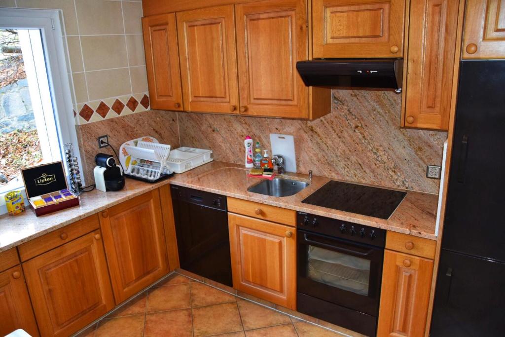Kuchyň nebo kuchyňský kout v ubytování Chalet Belmont