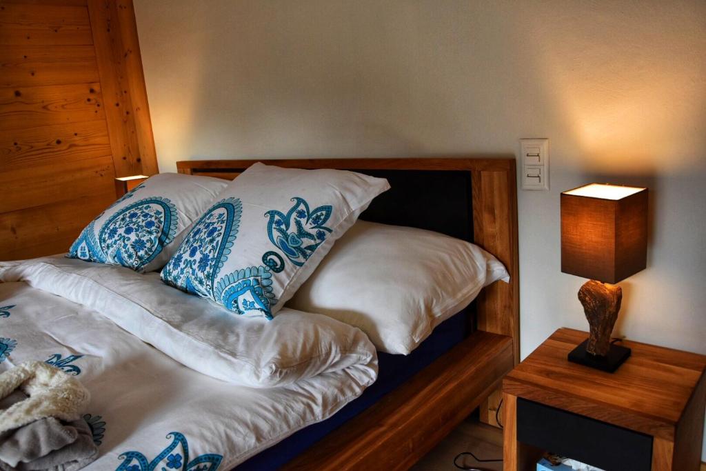 Postel nebo postele na pokoji v ubytování Chalet Belmont