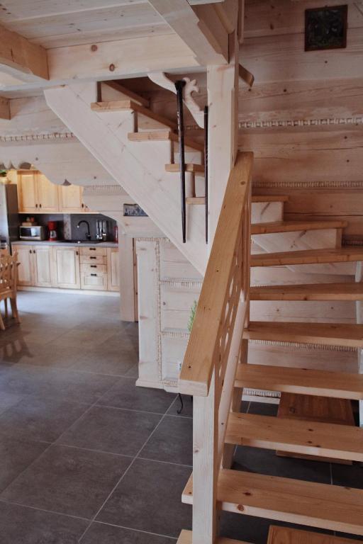 a staircase in the kitchen of a house at BIAŁY PUCH in Zakopane