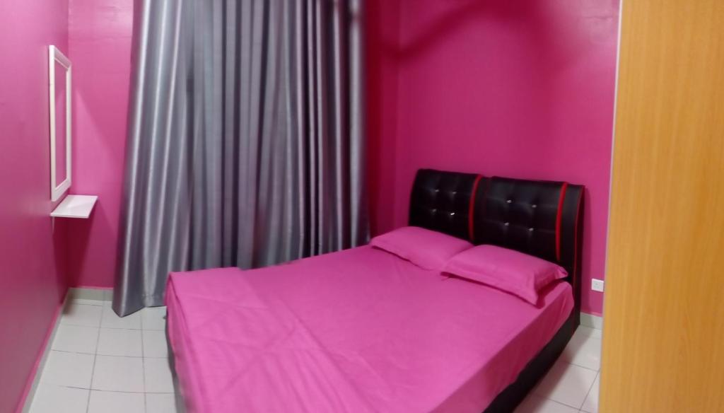 Postel nebo postele na pokoji v ubytování Mintsuite homestay