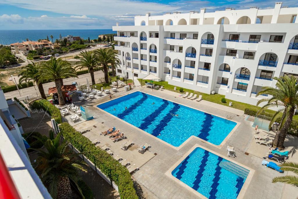 an aerial view of a hotel with a swimming pool at Linda Vista Mar T1, A-C, Wi-Fi, Porches in Porches