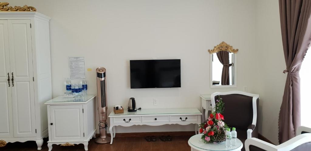 TV/trung tâm giải trí tại Carita Hotel
