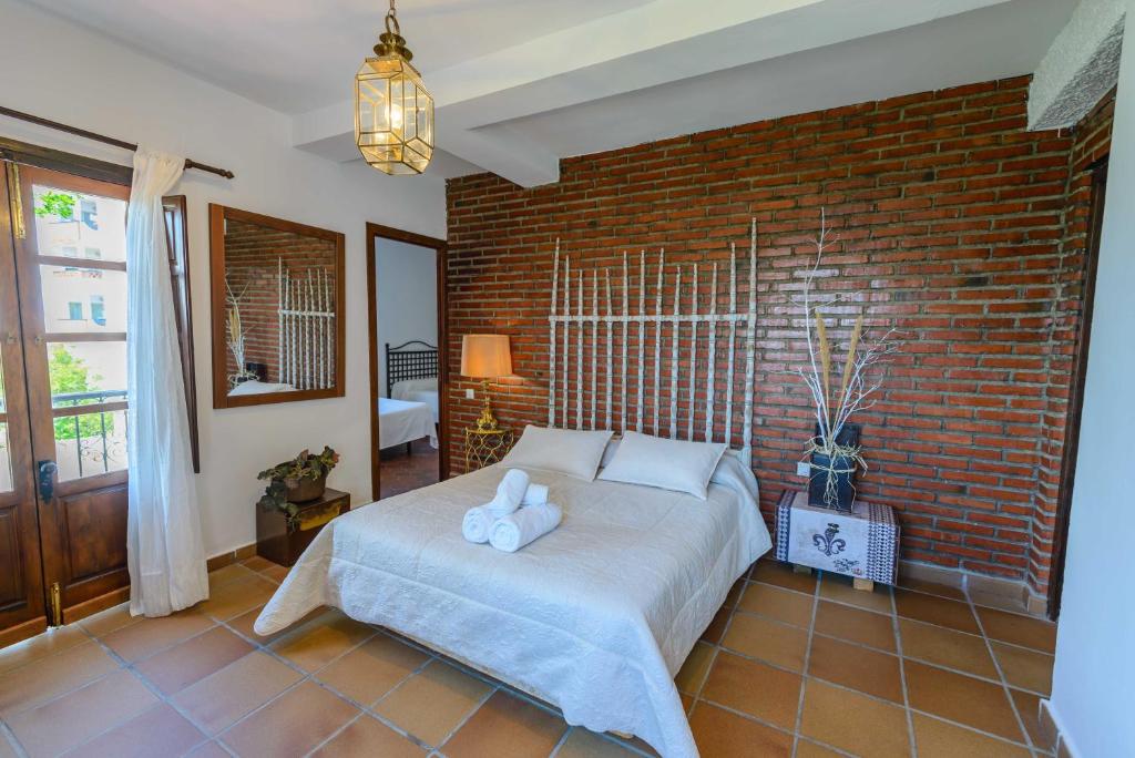 Posteľ alebo postele v izbe v ubytovaní Holiday Home El Alcázar