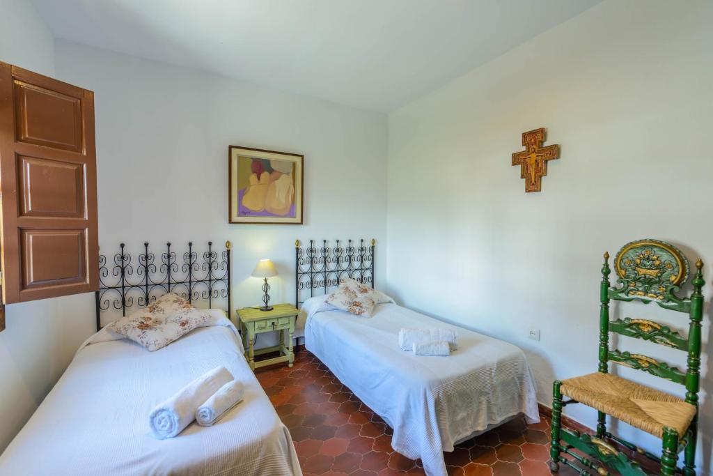 Posteľ alebo postele v izbe v ubytovaní Holiday Home El Alcázar
