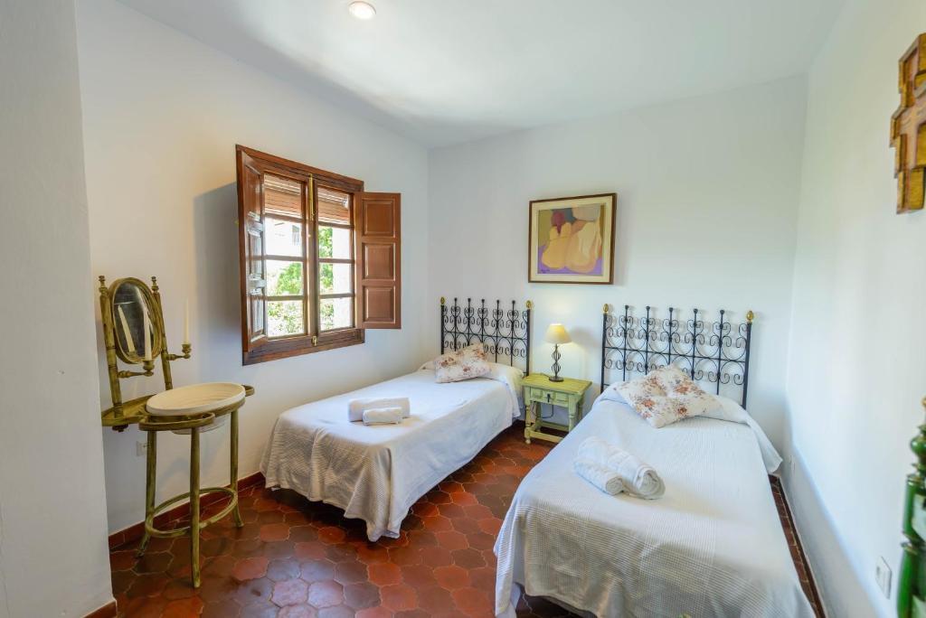 Posteľ alebo postele v izbe v ubytovaní Holiday Home El Alcázar
