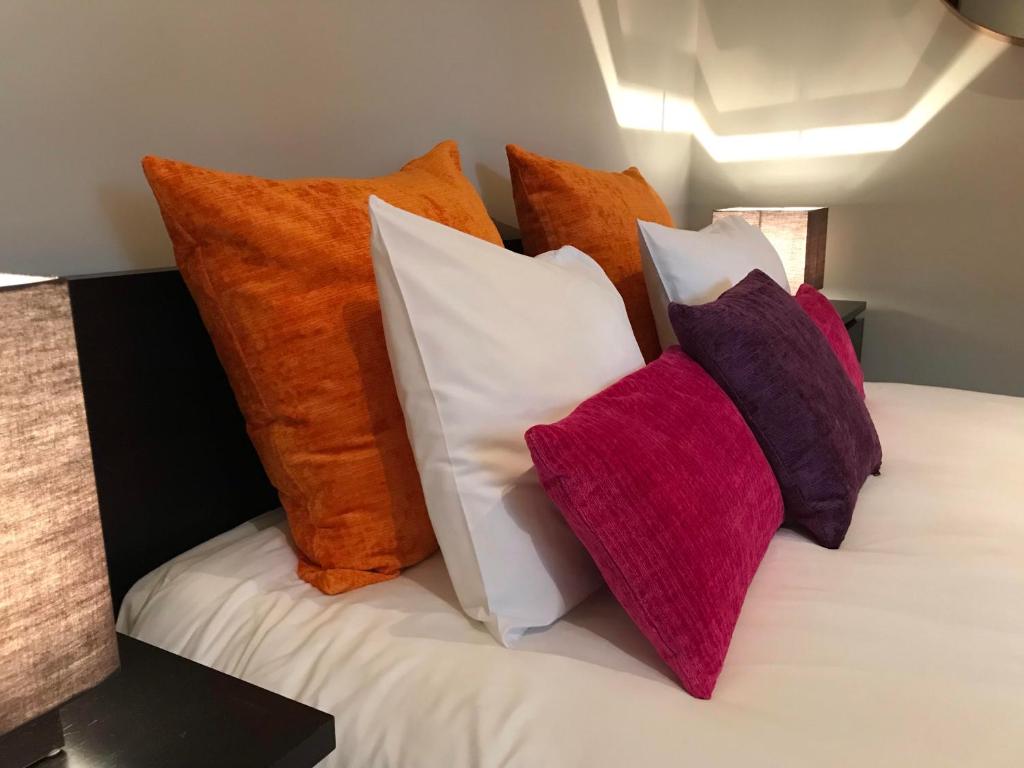 Postel nebo postele na pokoji v ubytování B&B L'Orangerie