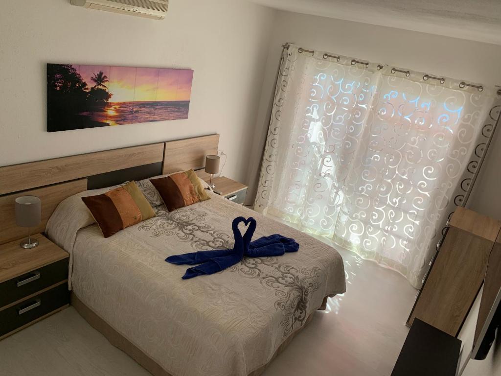 Postel nebo postele na pokoji v ubytování Los Cristianos Best Beach View