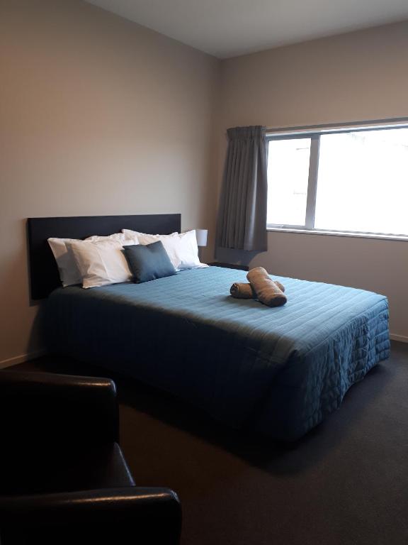 Postel nebo postele na pokoji v ubytování Northpark Motel
