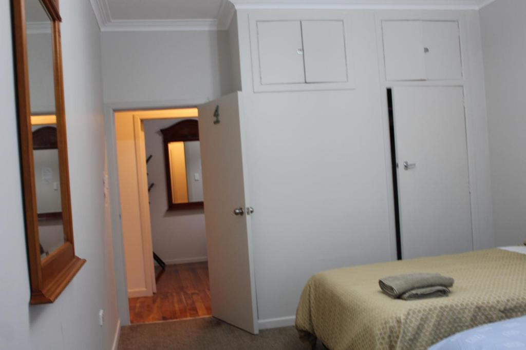 Postel nebo postele na pokoji v ubytování Mini Homestay