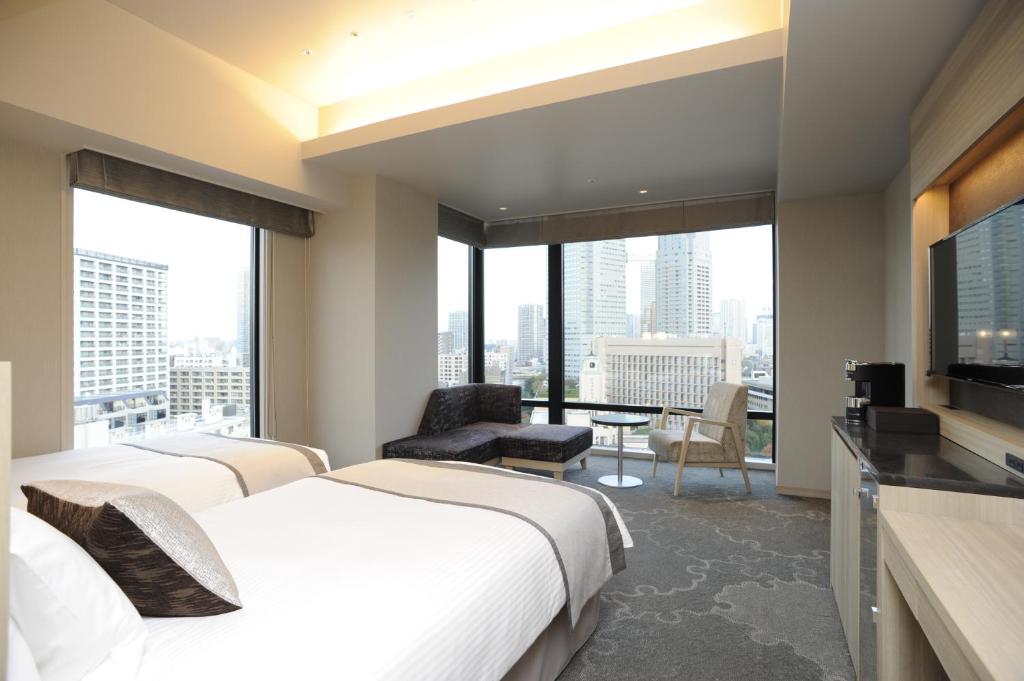 Postel nebo postele na pokoji v ubytování Hotel Keihan Tsukiji Ginza Grande