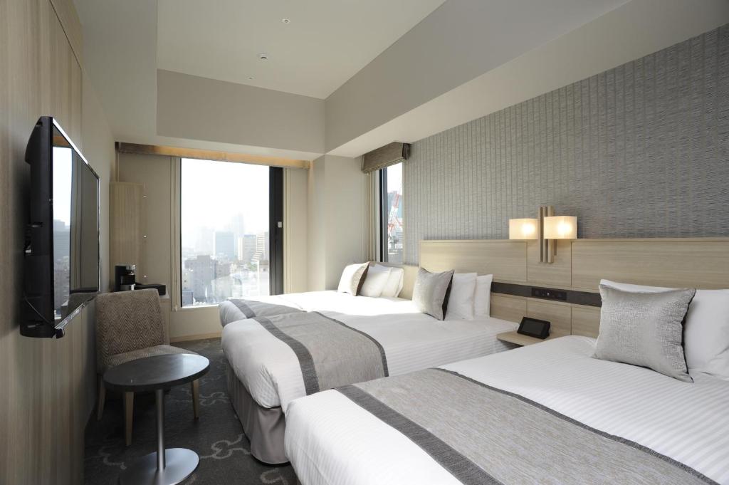 TV a/nebo společenská místnost v ubytování Hotel Keihan Tsukiji Ginza Grande