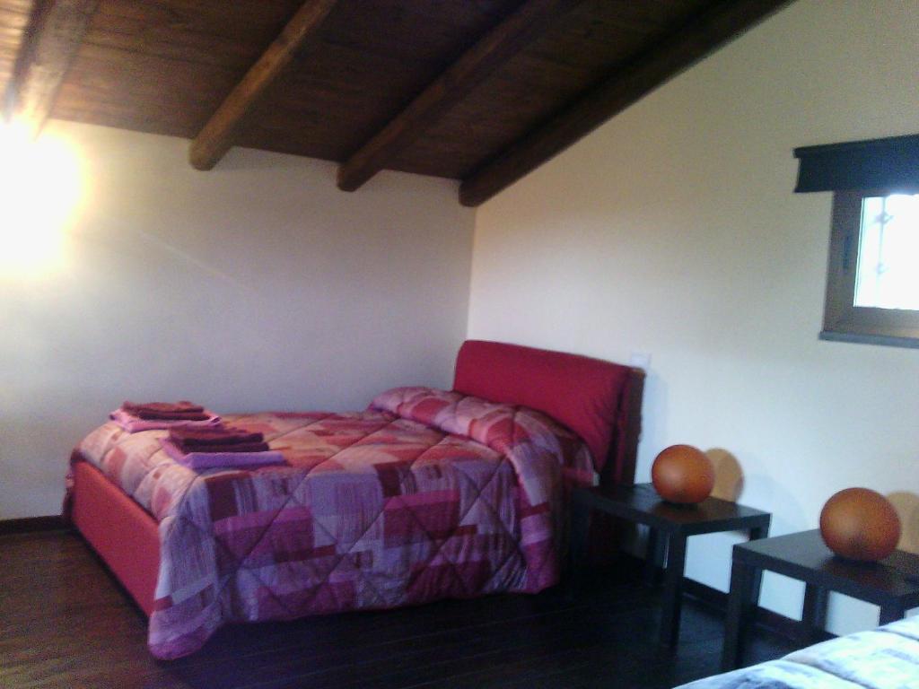 Postel nebo postele na pokoji v ubytování Chalet Etna