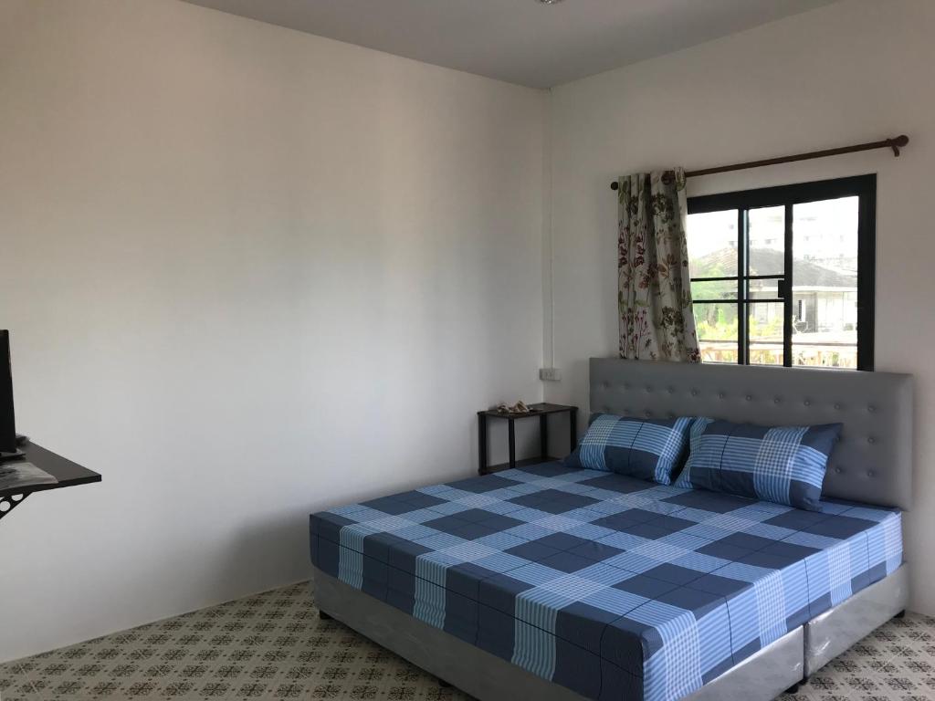 Postel nebo postele na pokoji v ubytování grandmabalcony