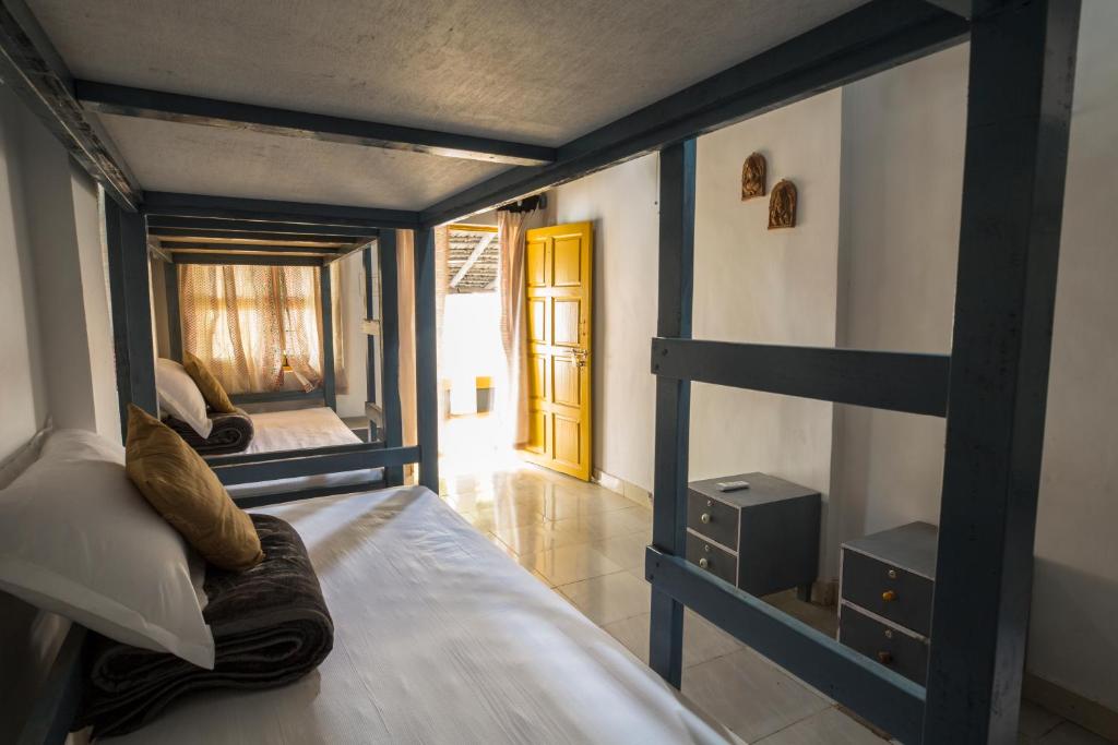 Postel nebo postele na pokoji v ubytování Craft Hostels