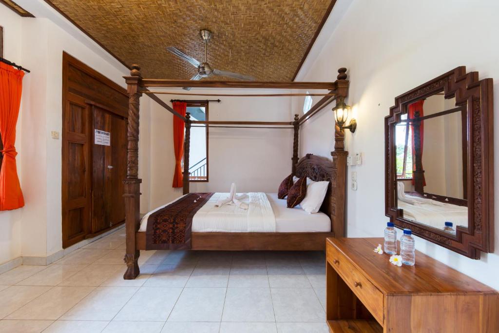 Postel nebo postele na pokoji v ubytování Sayong House