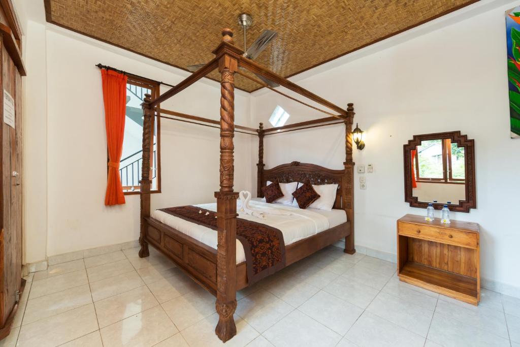 Postel nebo postele na pokoji v ubytování Sayong House