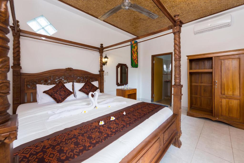 Postel nebo postele na pokoji v ubytování Sayong House