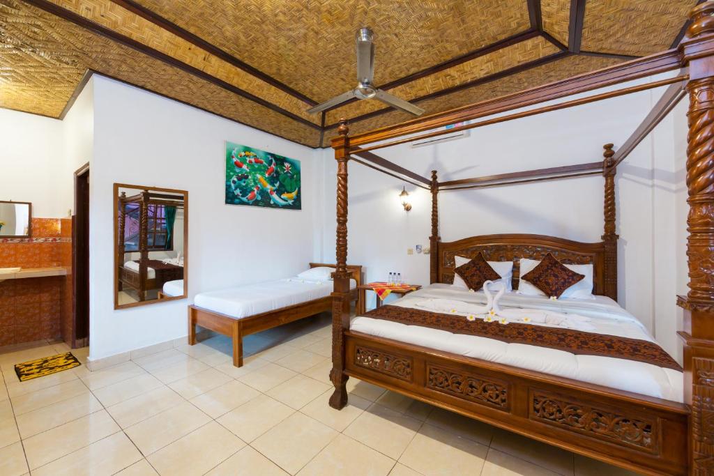 Postel nebo postele na pokoji v ubytování Sayong House