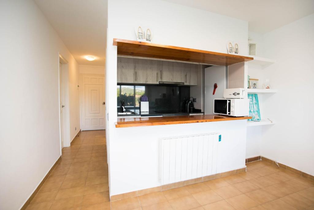 Kuchyňa alebo kuchynka v ubytovaní Espectacular apartamento en el corazón de Calella!