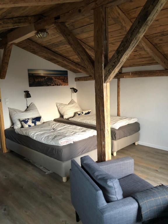 Tempat tidur dalam kamar di Netzschuppen