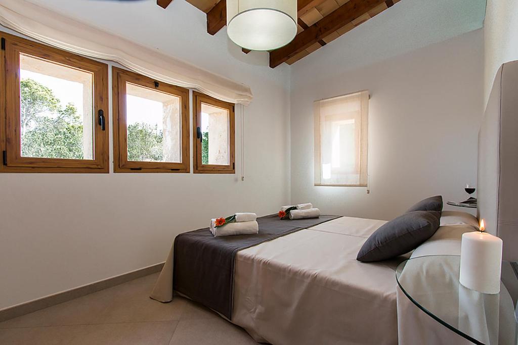 Postel nebo postele na pokoji v ubytování Country House Sa Serra