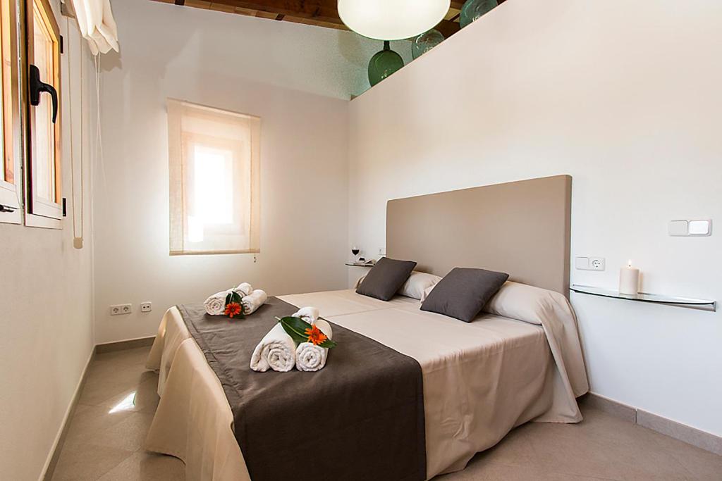 Postel nebo postele na pokoji v ubytování Country House Sa Serra