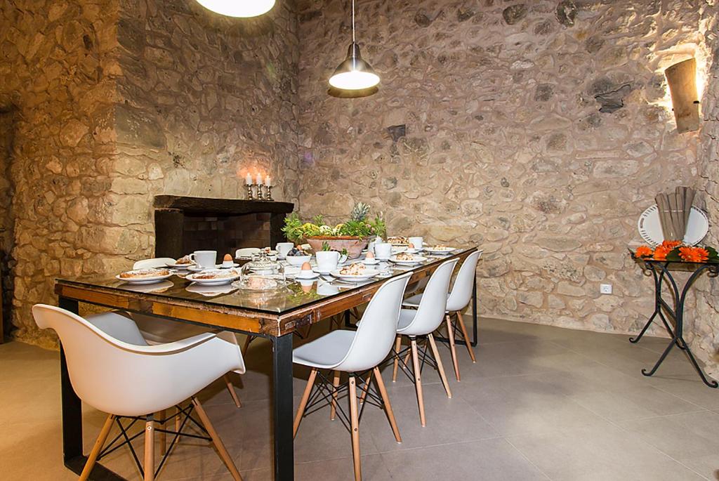 Posezení v ubytování Country House Sa Serra