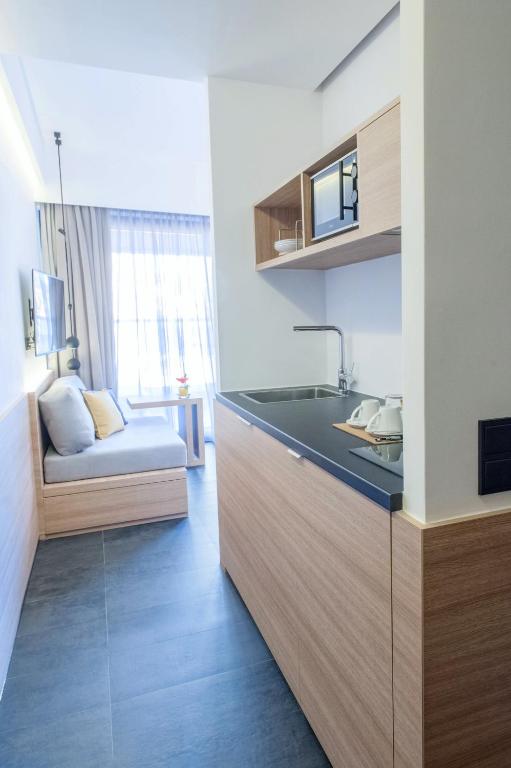 Kuchyň nebo kuchyňský kout v ubytování Athens Lodge by Athens Prime Hotels