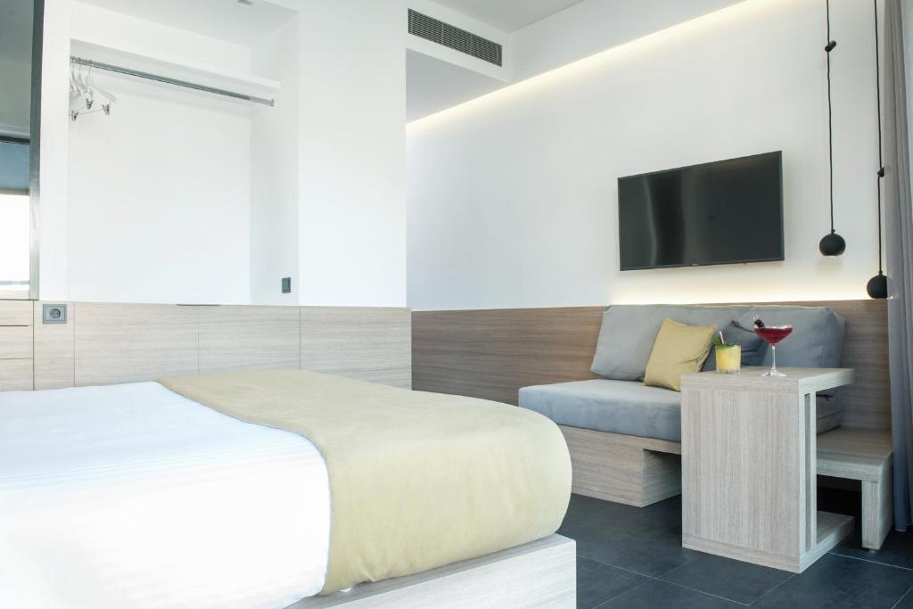 Postel nebo postele na pokoji v ubytování Athens Lodge by Athens Prime Hotels