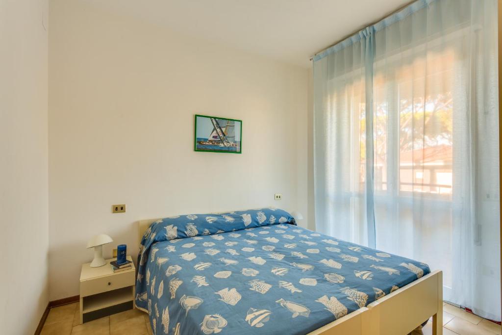 Postel nebo postele na pokoji v ubytování Oltremare Appartamenti