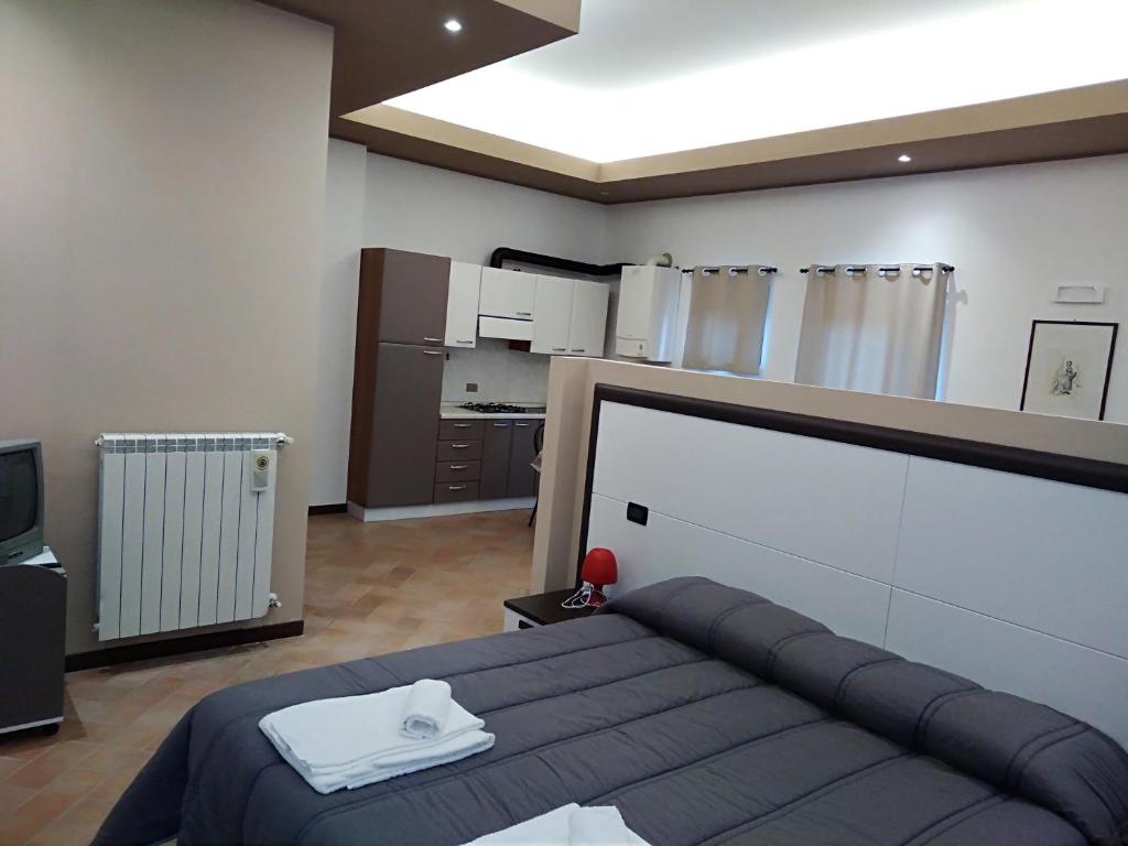 Postel nebo postele na pokoji v ubytování R&B Il Parco