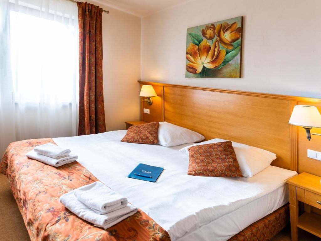 Postel nebo postele na pokoji v ubytování Eco Active Resort PIENINY