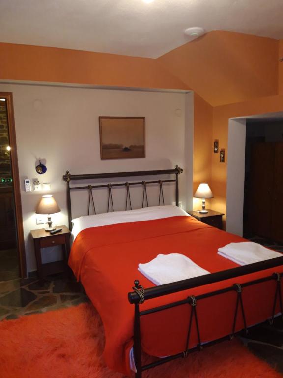 Postel nebo postele na pokoji v ubytování Guest House "Aspasia"