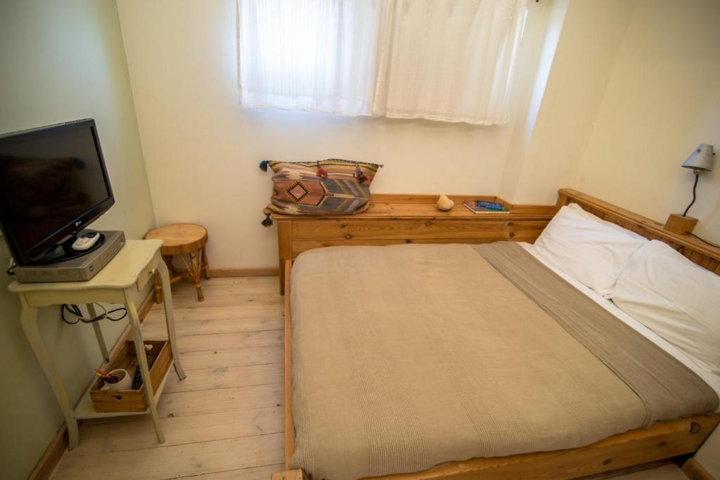 Letto o letti in una camera di Desert Home