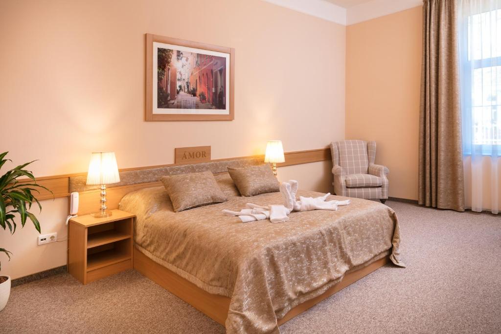 Postel nebo postele na pokoji v ubytování Aquasol Resort