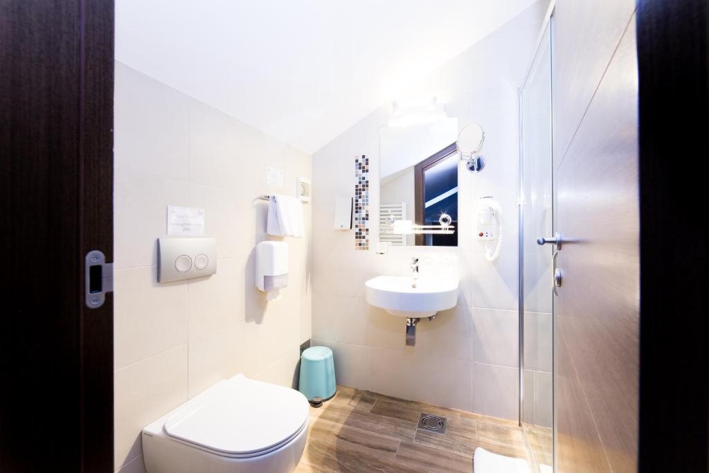 Koupelna v ubytování Garni Hotel Mint