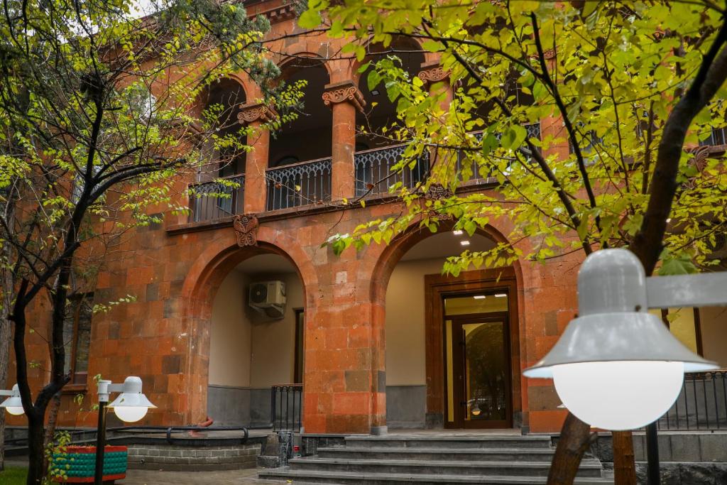a building with a bell in front of it at AnnaBella Boutique Hotel in Yerevan