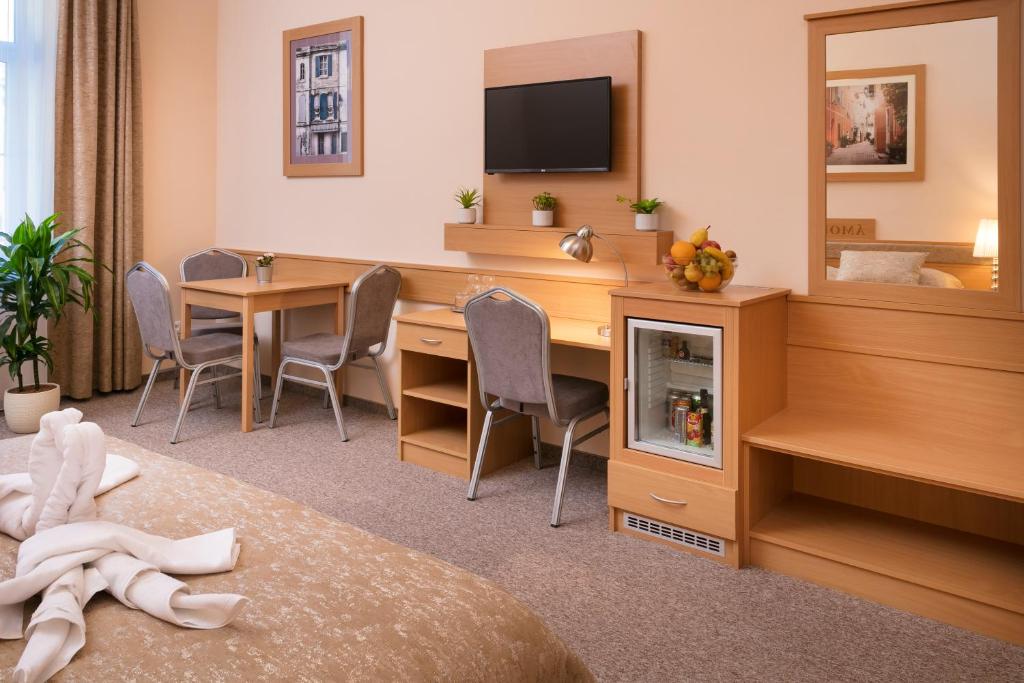 TV a/nebo společenská místnost v ubytování Aquasol Resort