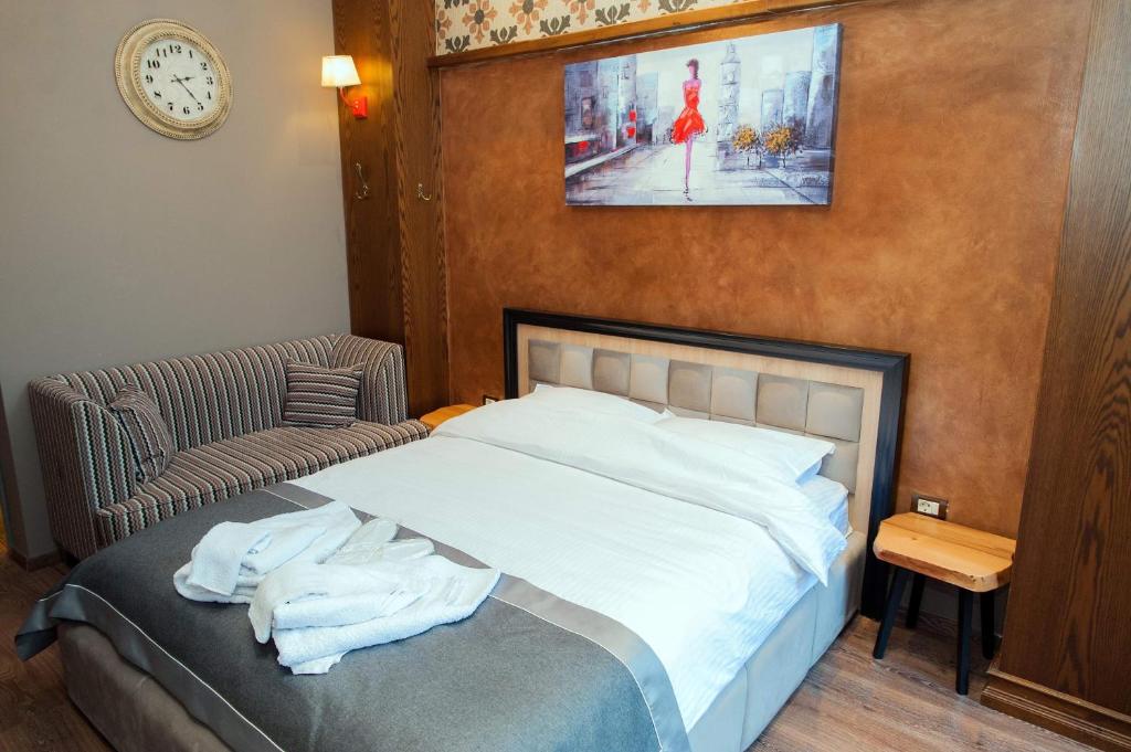 Postel nebo postele na pokoji v ubytování Guest House People