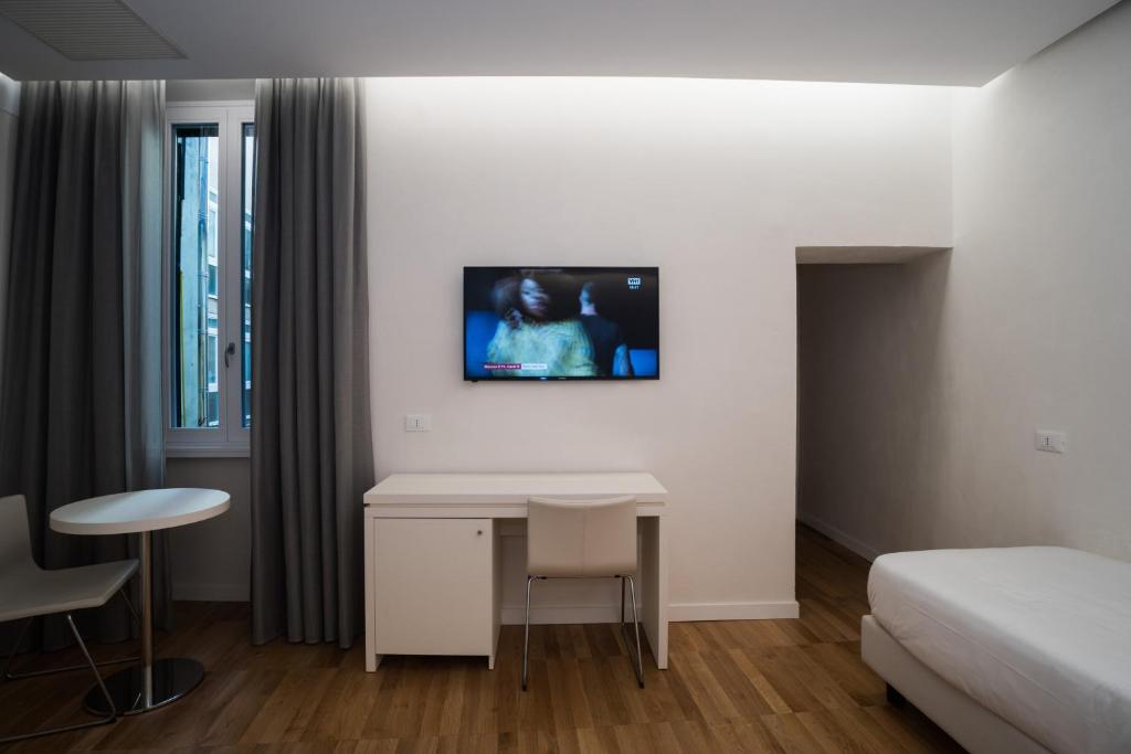 Telewizja i/lub zestaw kina domowego w obiekcie Trevi Elite Rome