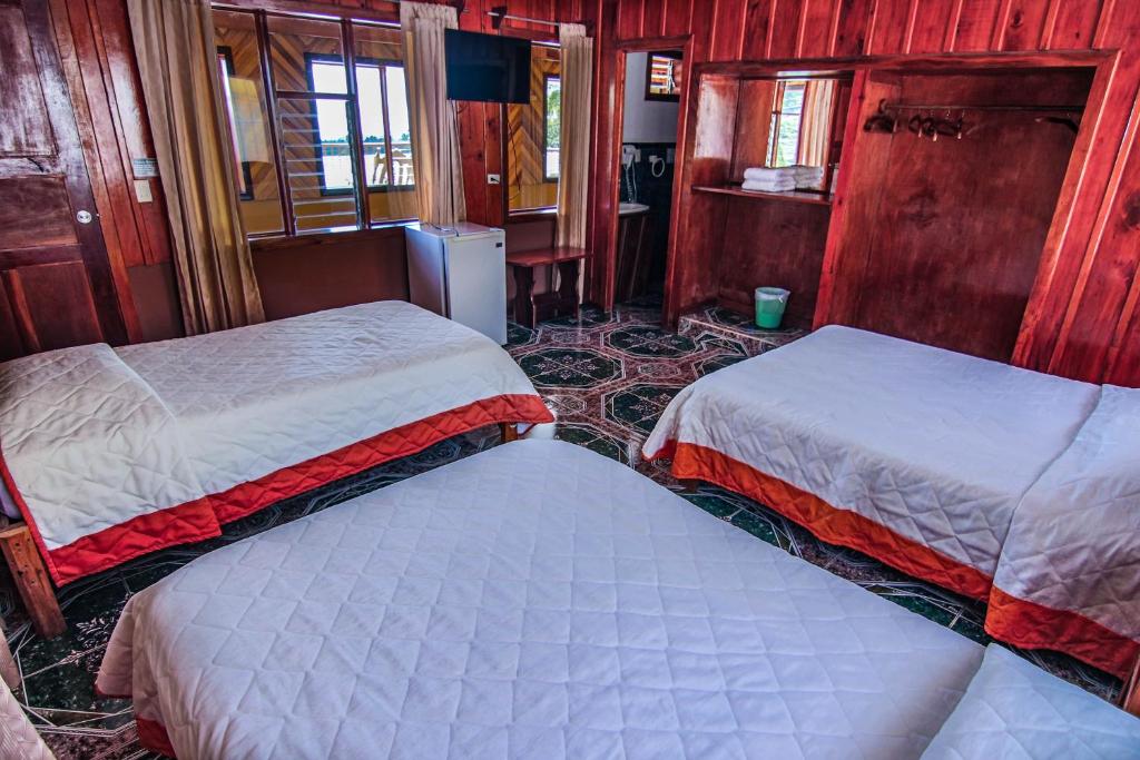 Postel nebo postele na pokoji v ubytování Hotel Don Taco