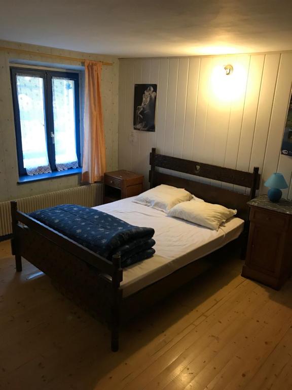 Posteľ alebo postele v izbe v ubytovaní Les Gîtes du Kula
