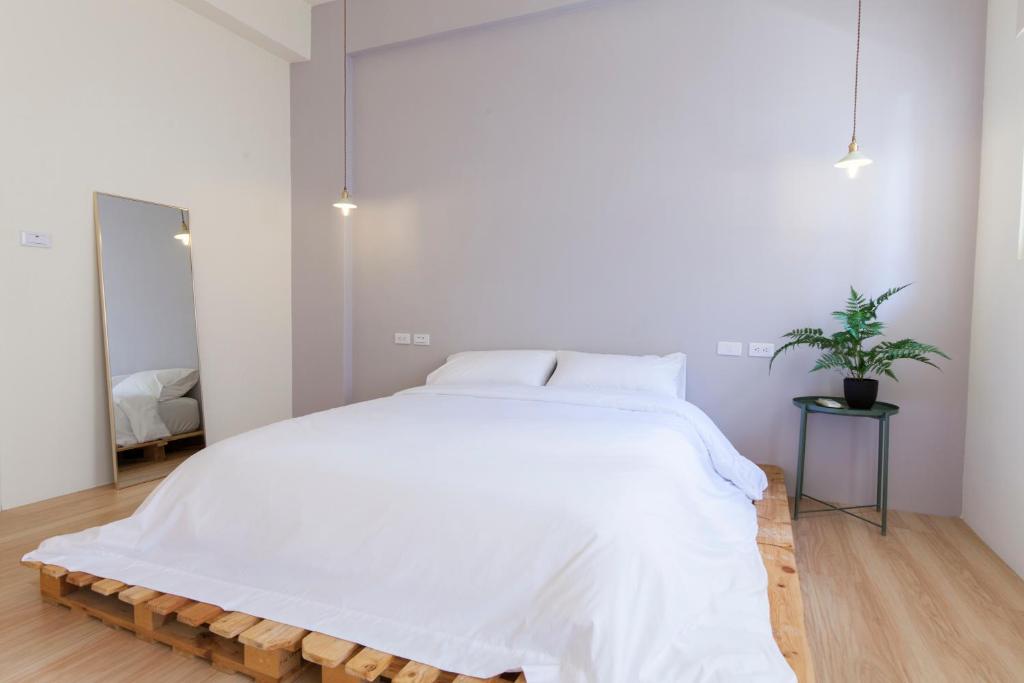 Postel nebo postele na pokoji v ubytování 01+ Home